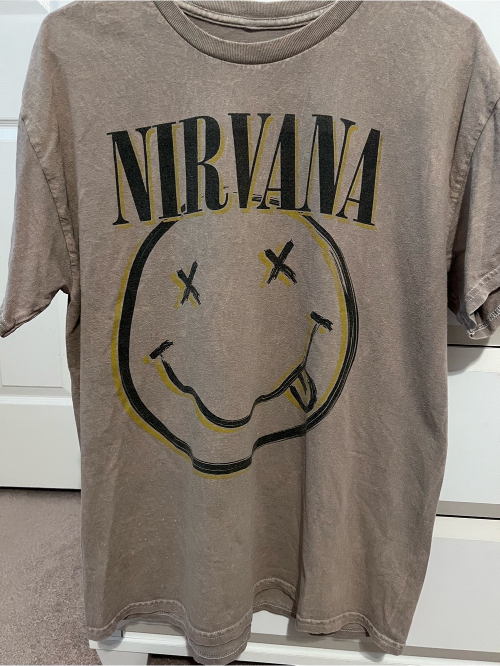 NIRVANA Brown Short‑Sleeve Tee with Black & Yellow Smiley Graphic